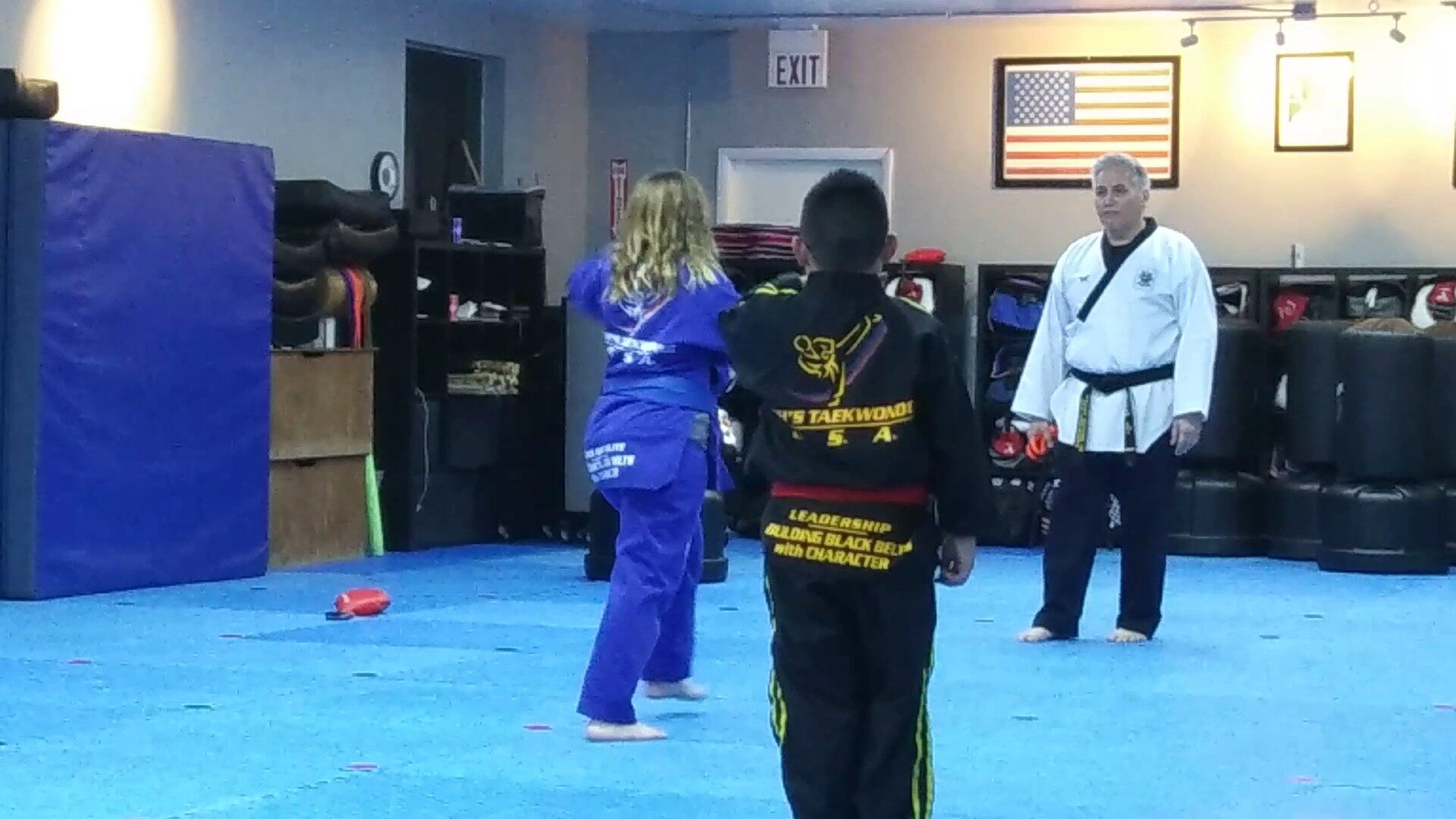 A Adult Martial Arts student smiling proudly after class at Oh's Martial Arts in Seminole