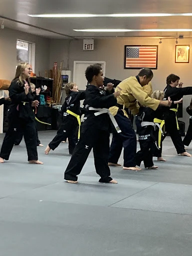 Black belt students training together in class at Oh's Martial Arts in Seminole